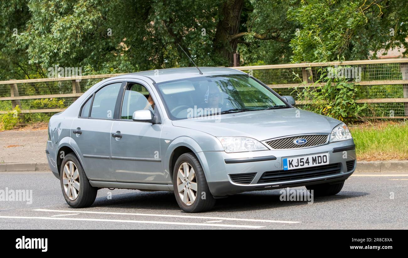 Milton Keynes,UK - June 18th 2023: 2004 silver FORD MONDEO car travelling on an English road Stock Photo