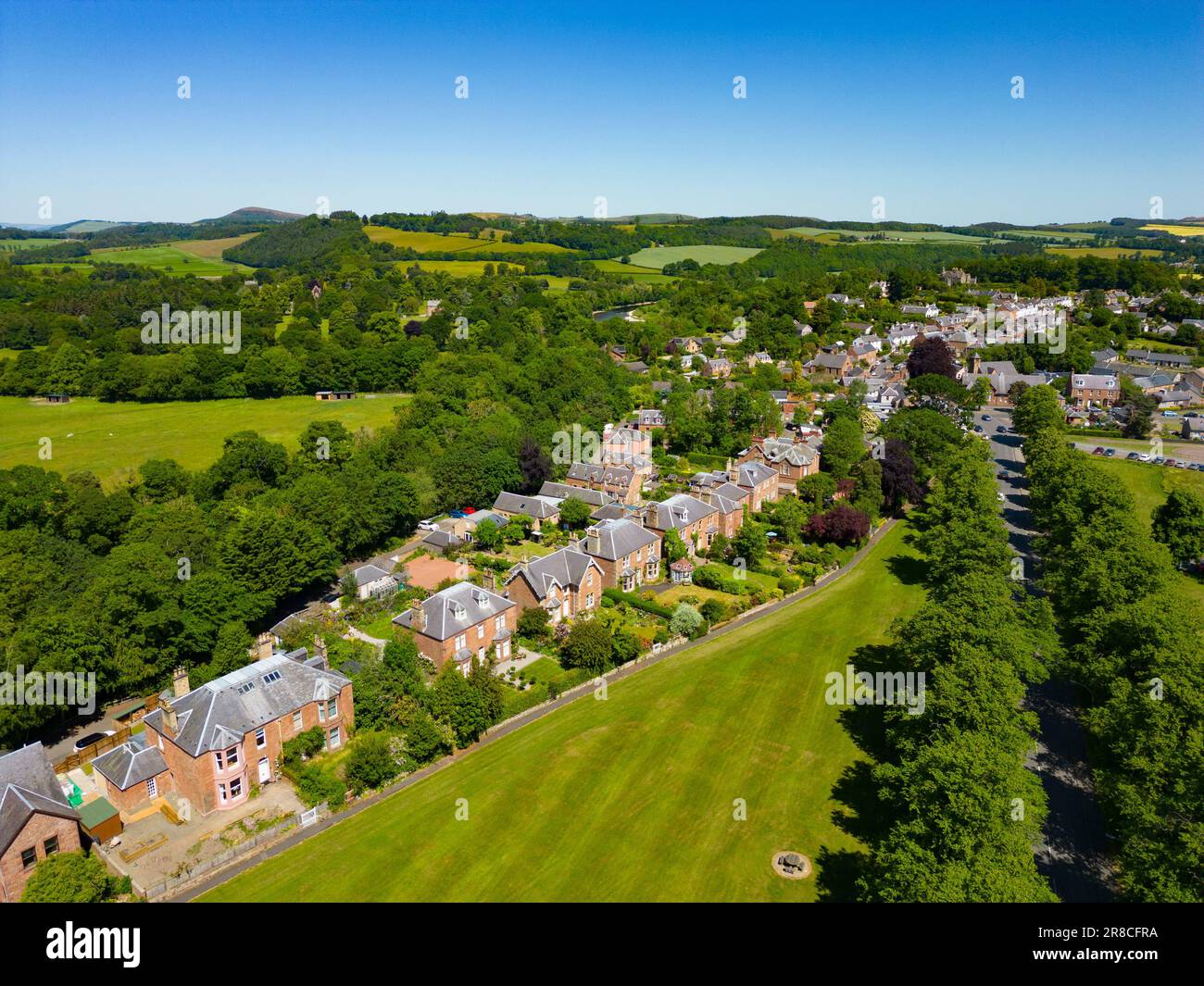 Aerial view from drone of row of large detached villas in village of St Boswells in Scottish Borders, Scotland, UK Stock Photo