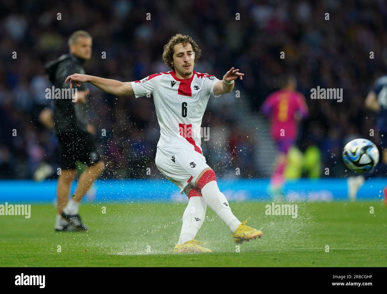 Georgia's Luka Gagnidze warms up while play is suspended during the UEFA Euro 2024 Qualifying Group A match at Hampden Park, Glasgow. Picture date: Tuesday June 20, 2023. Stock Photo