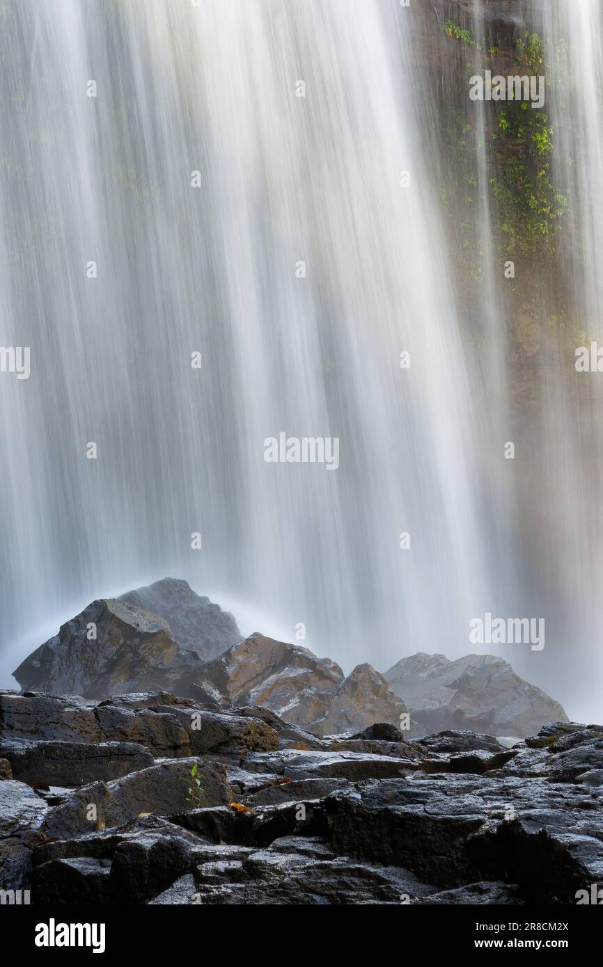 The Bousra waterfall with long exposure in the daylight in Cambodia Stock Photo