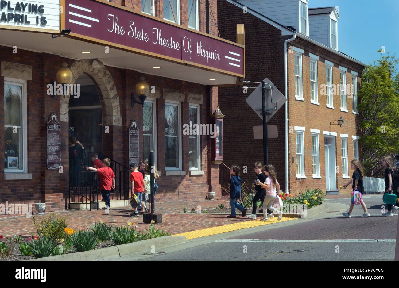 Children enter the landmark Barter Theatre in Abingdon, Virginia, the