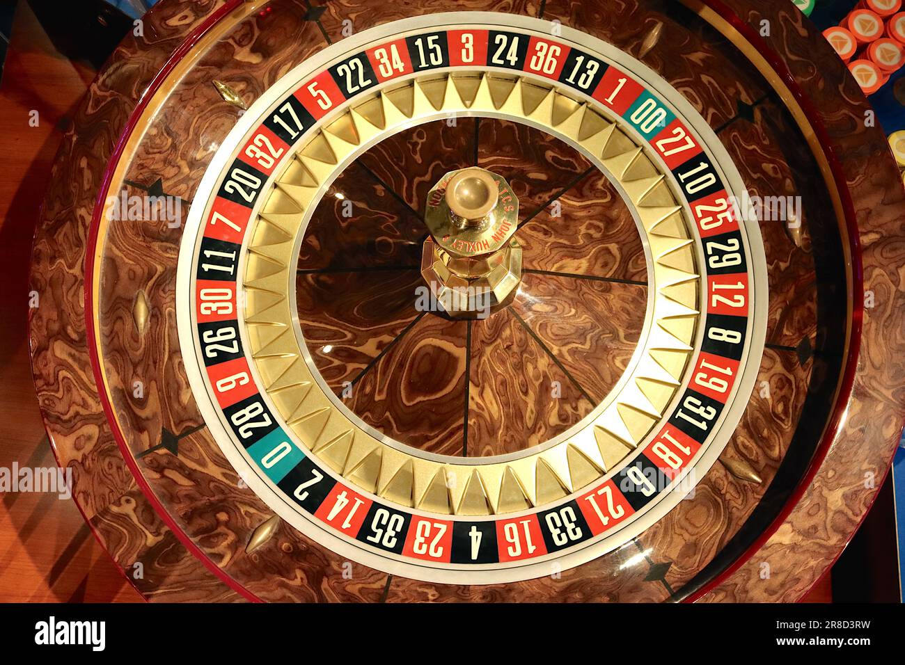 Casino roulette wheel displaying 38 wheel numbers and pockets featuring a double zero pocket, making this an American style wheel, April 2023.. Stock Photo
