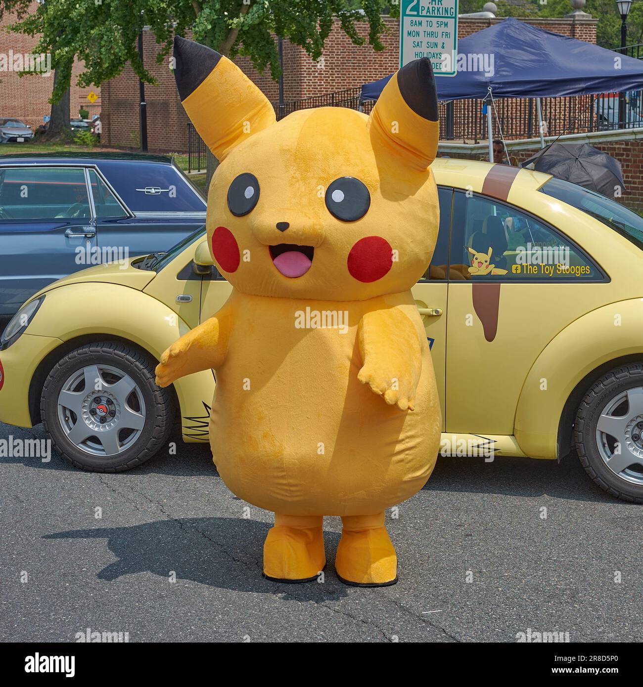 A cosplayer dressed as Pokemon character Pikachu at the Dover Comic Con