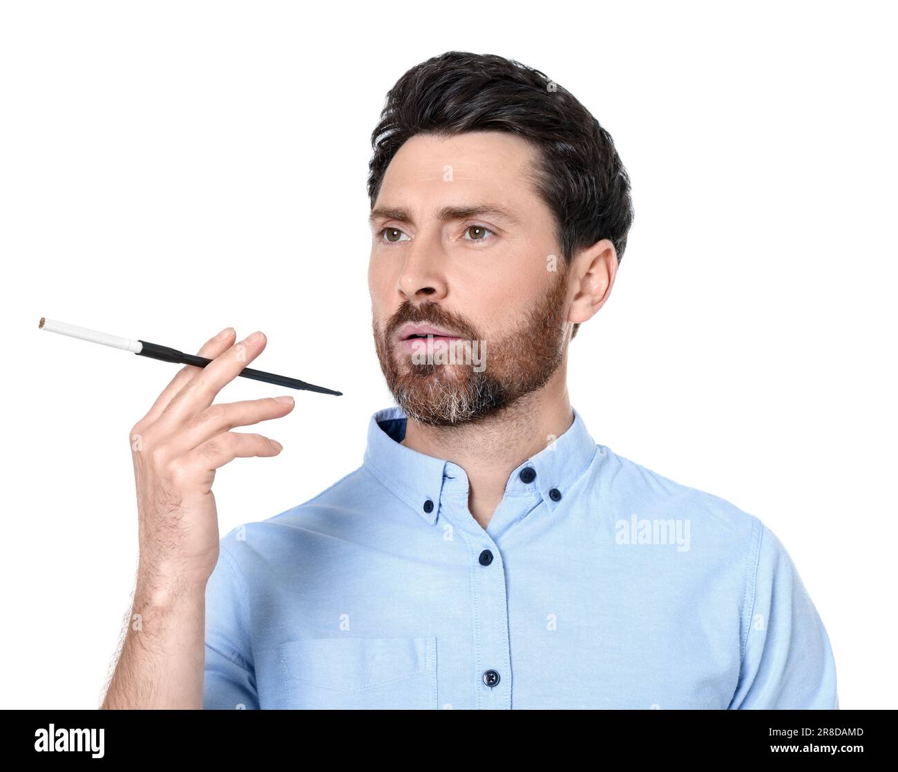 Man using long cigarette holder for smoking isolated on white Stock Photo