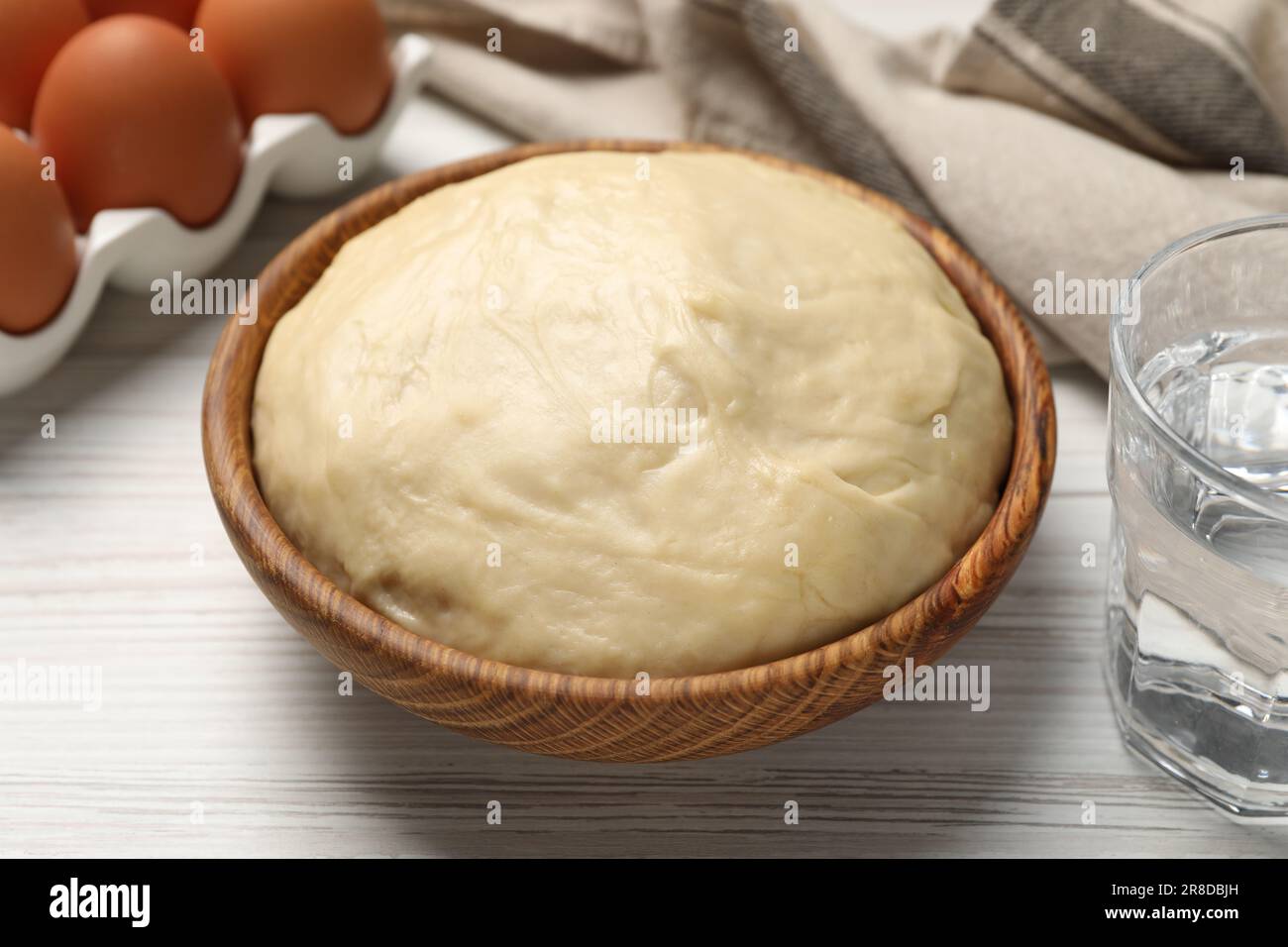 Cooking scones with soda water. Dough and ingredients on white wooden table Stock Photo Alamy