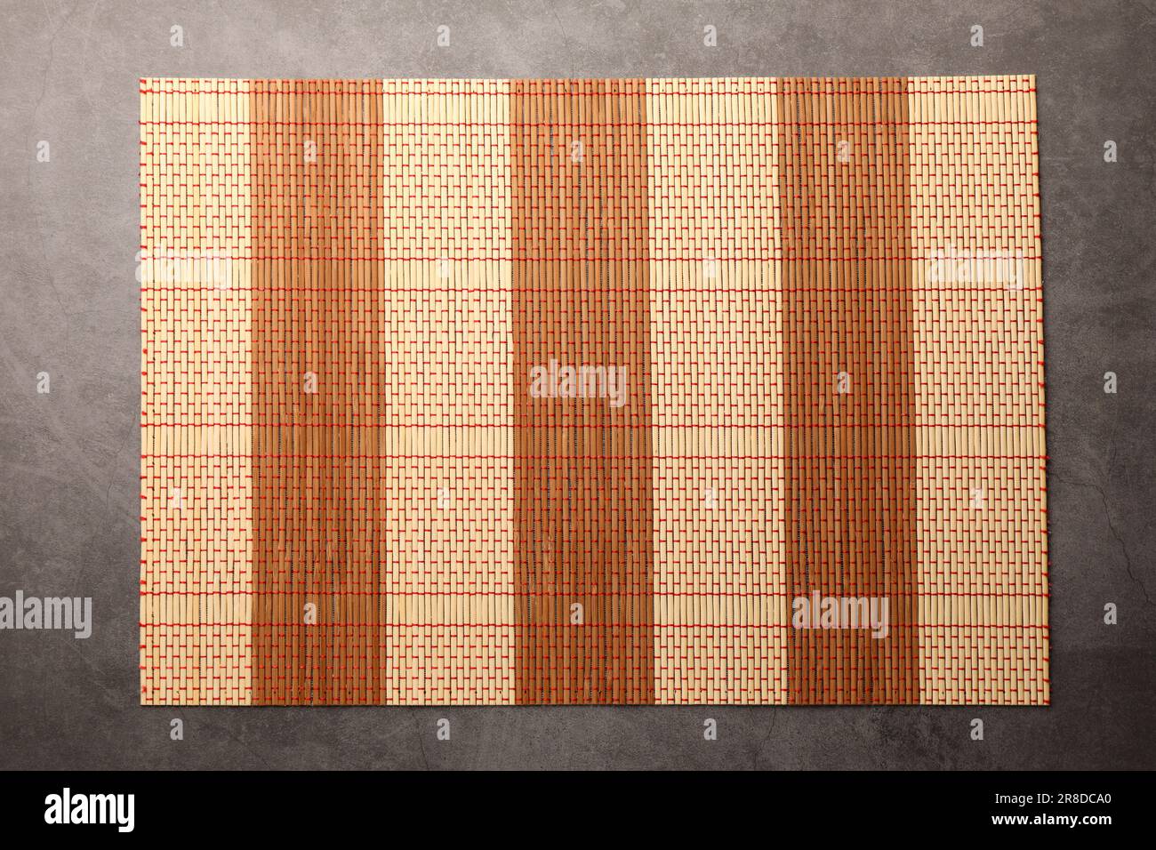 Bamboo mat on grey table, top view. Space for text Stock Photo - Alamy