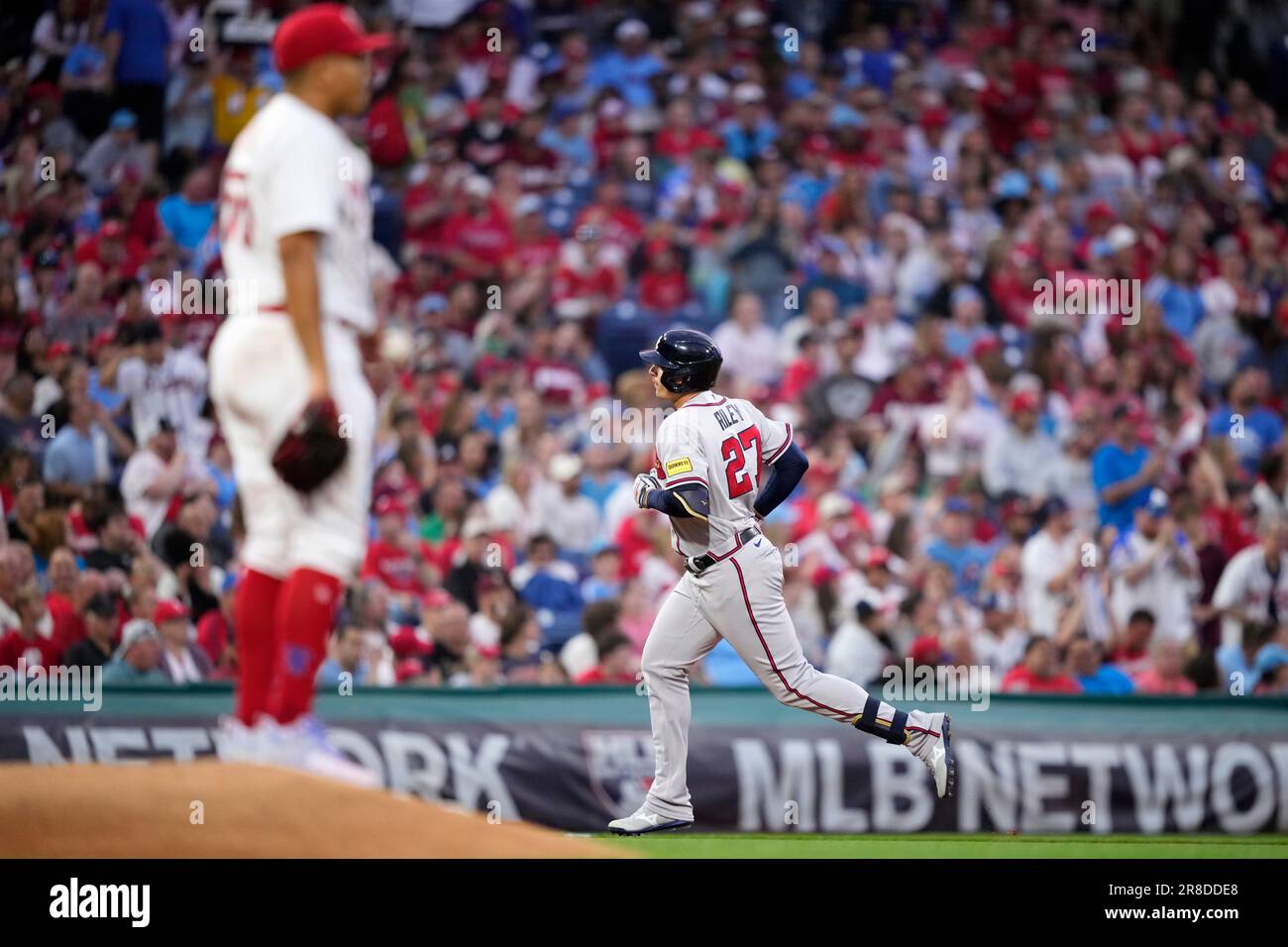 Atlanta Braves' Austin Riley, right, rounds the bases after hitting a home run against