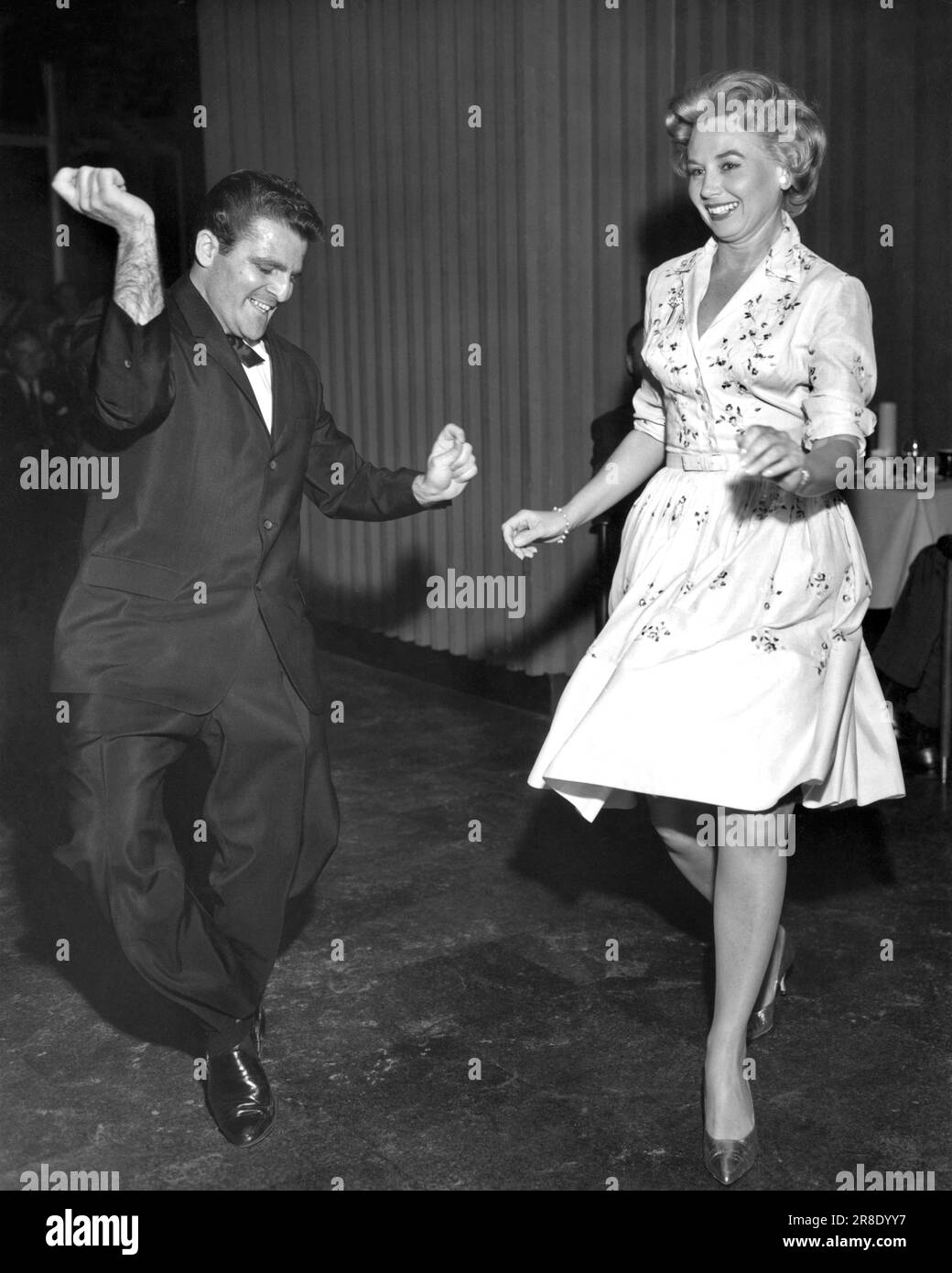 Palm Springs, California: c. 1962. A couple livens up the dance floor