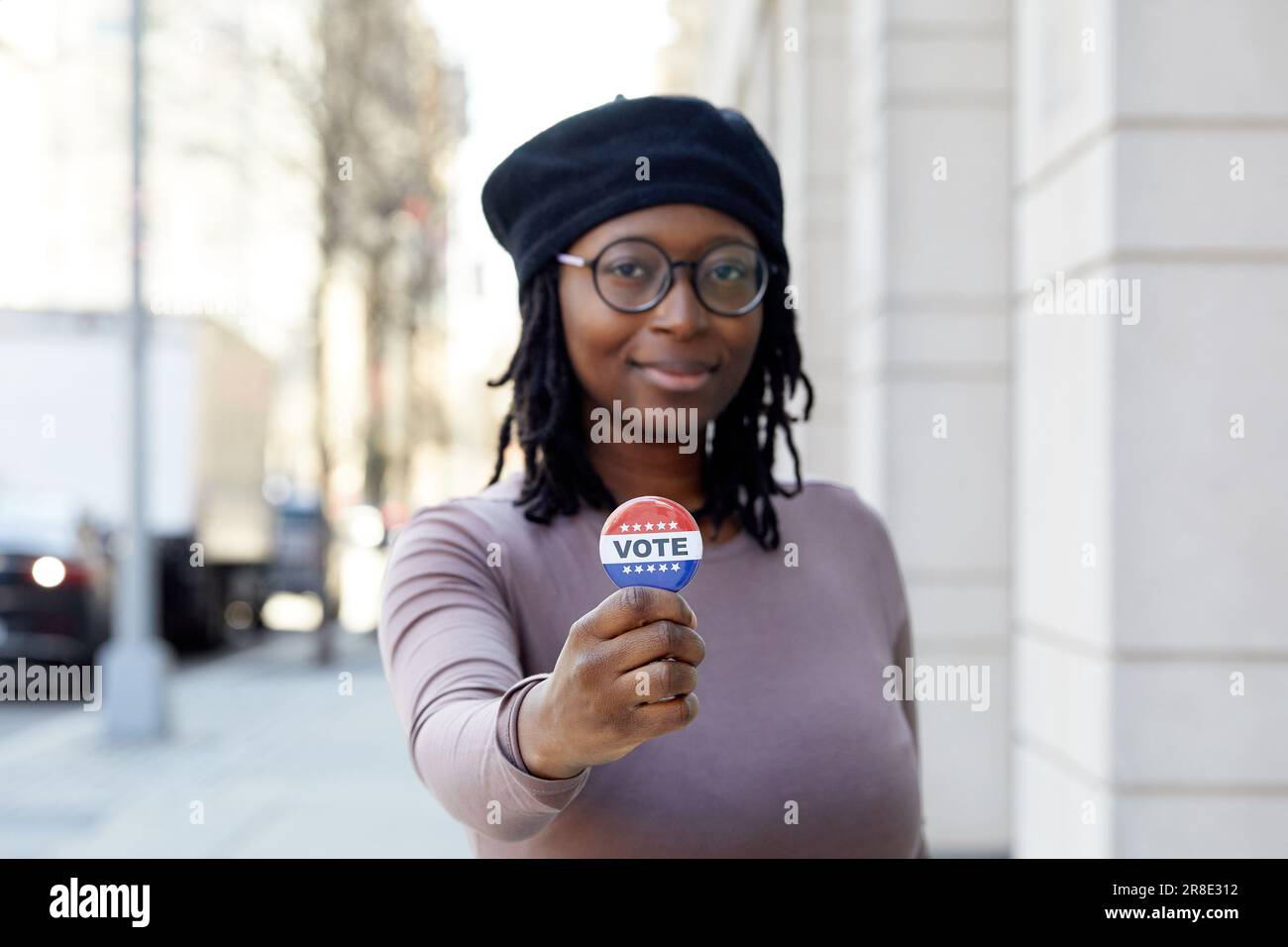 Smiling woman in beret showing hi-res stock photography and images - Alamy