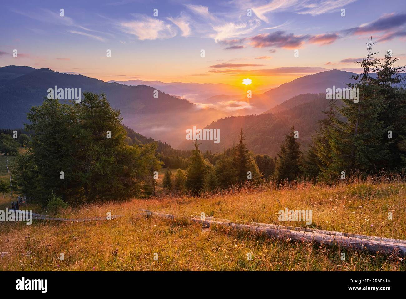 Ukraine, Ivano Frankivsk region, Verkhovyna district, Dzembronya village, Carpathian Mountains landscape at sunset Stock Photo