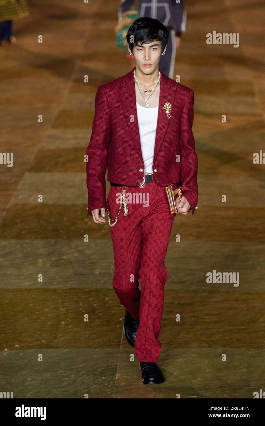 A model walks the runway during the Louis Vuitton Menswear News