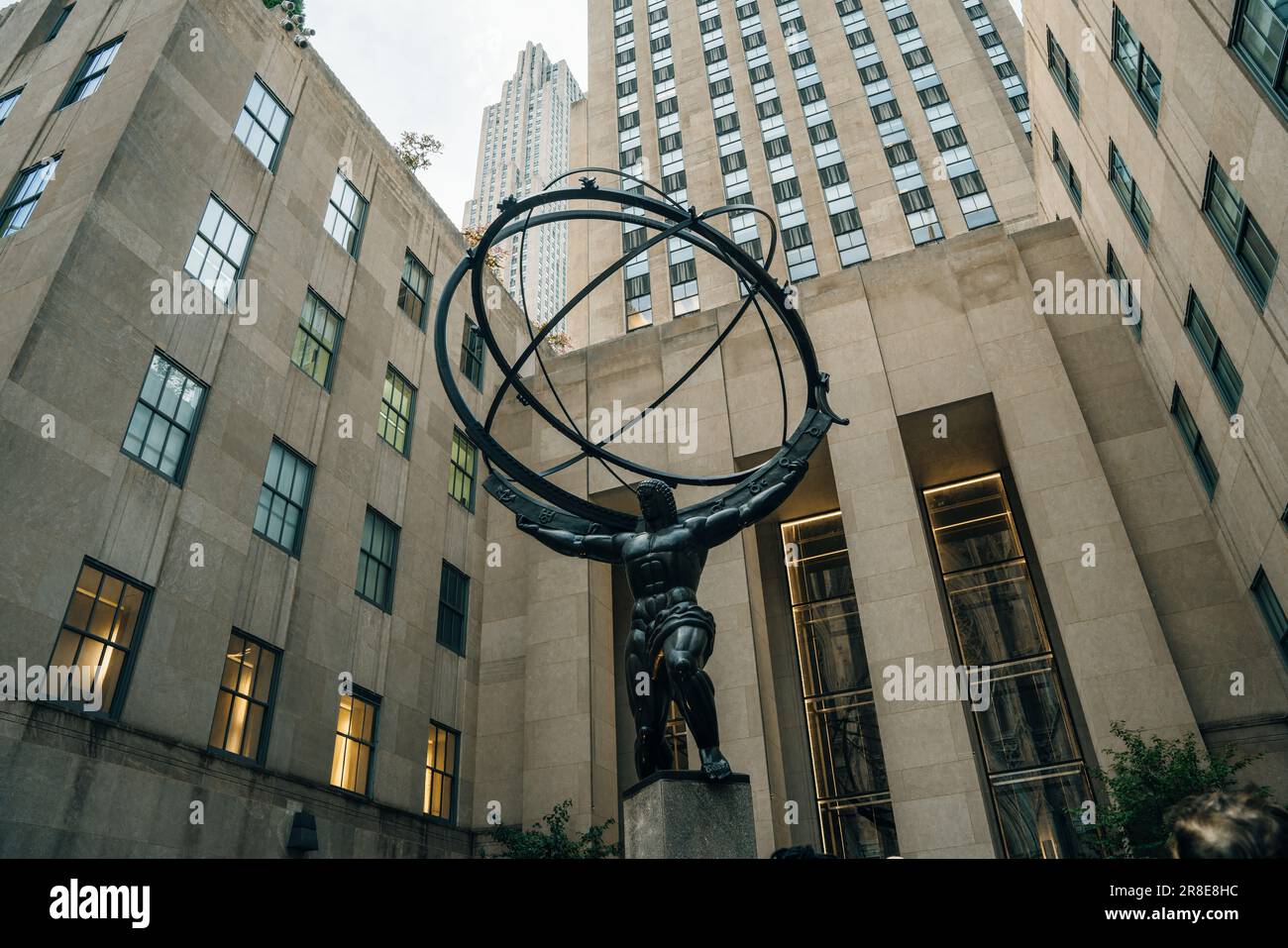 NEW YORK CITY, NY - DEC 2022 Atlas statue and St. Patrick's Cathedral. High quality photo Stock Photo