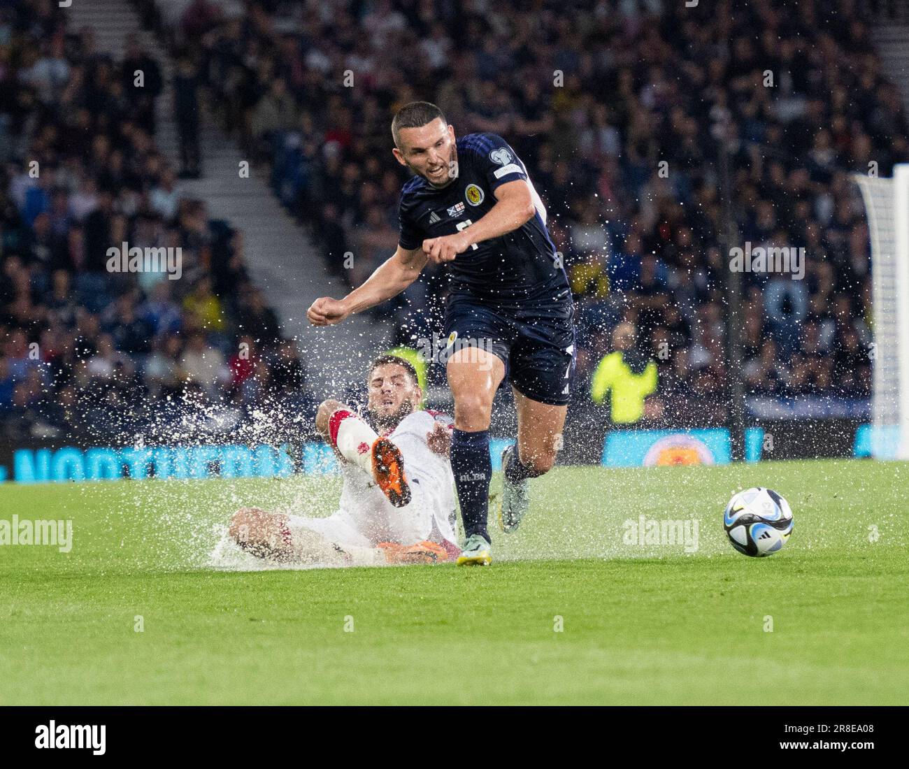 GLASGOW, SCOTLAND - JUNE 20: Scotland midfielder, John McGinn, brings the ball upfield during the UEFA EURO 2024 qualifying round group A match between Scotland and Georgia at Hampden Park on June 20, 2023 in Glasgow, Scotland. (Photo by Ian Jacobs/MB Media/) Stock Photo