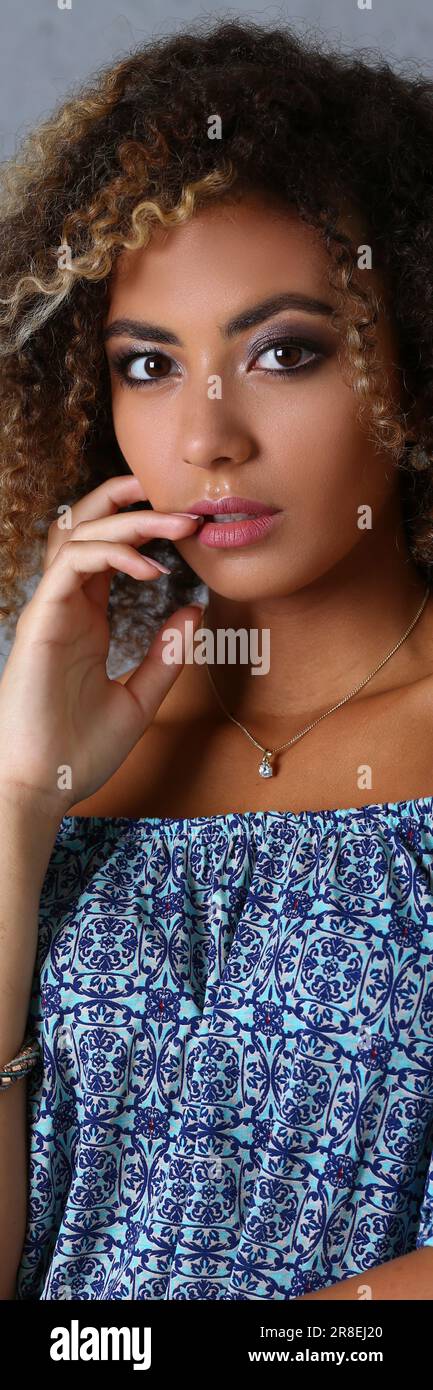 Portrait cute latina girl curly hi-res stock photography and images - Alamy