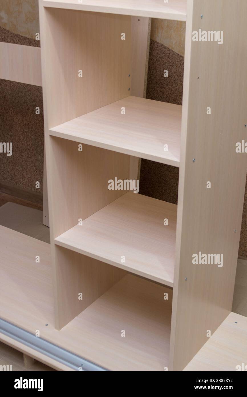 furniture with shelves installation Stock Photo Alamy