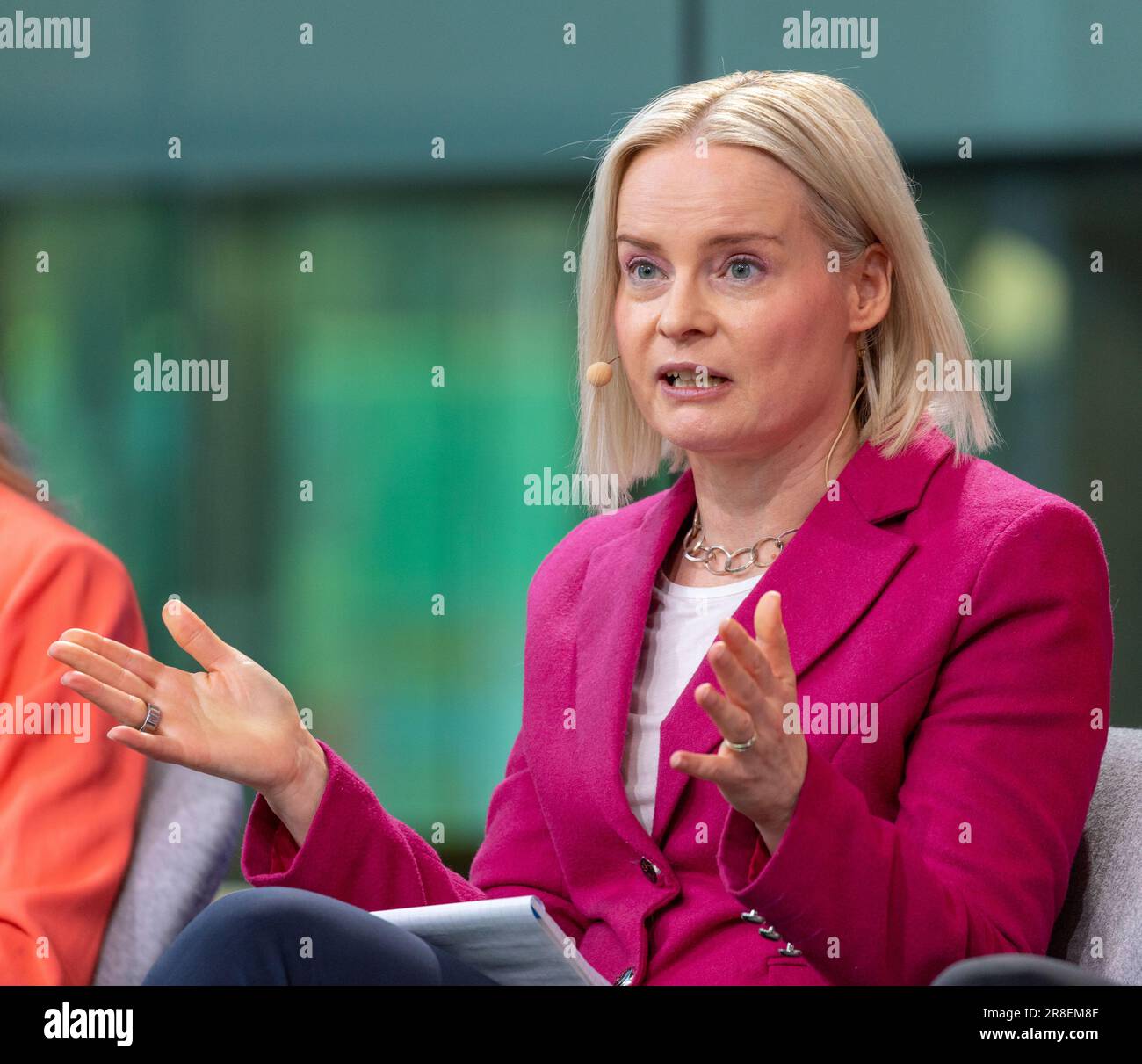 Riikka Purra campaigning in a panel discussion of party leaders before Finnish Parliamentary elections of 2023. Stock Photo