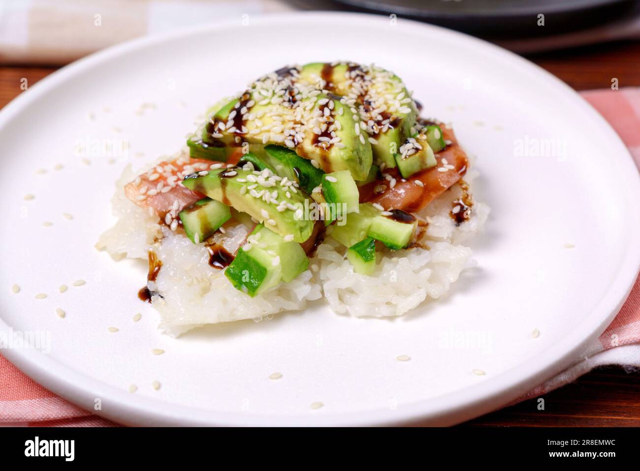 Sushi Waffle is crispy rice, made in a waffle maker, topped with shoyu