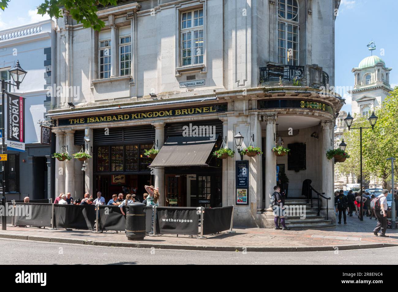 The Isambard Kingdom Brunel, a popular Wetherspoon pub in Portsmouth, Hampshire,England, UK, with people sitting outside having drinks Stock Photo