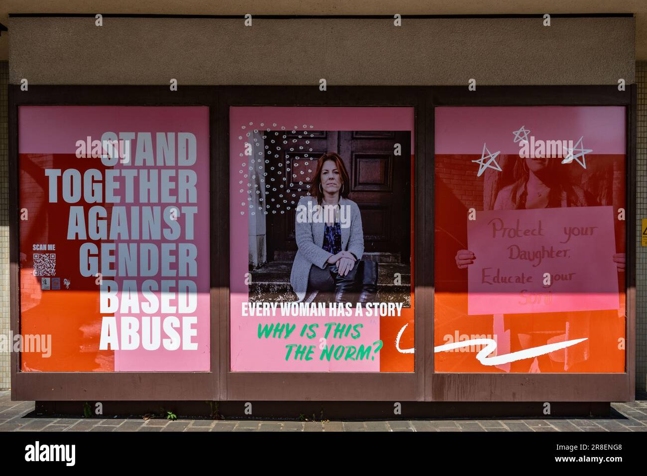 Notice with message; Stand together against gender-based abuse, slogan Protect your daughter, Educate your son, England, UK Stock Photo