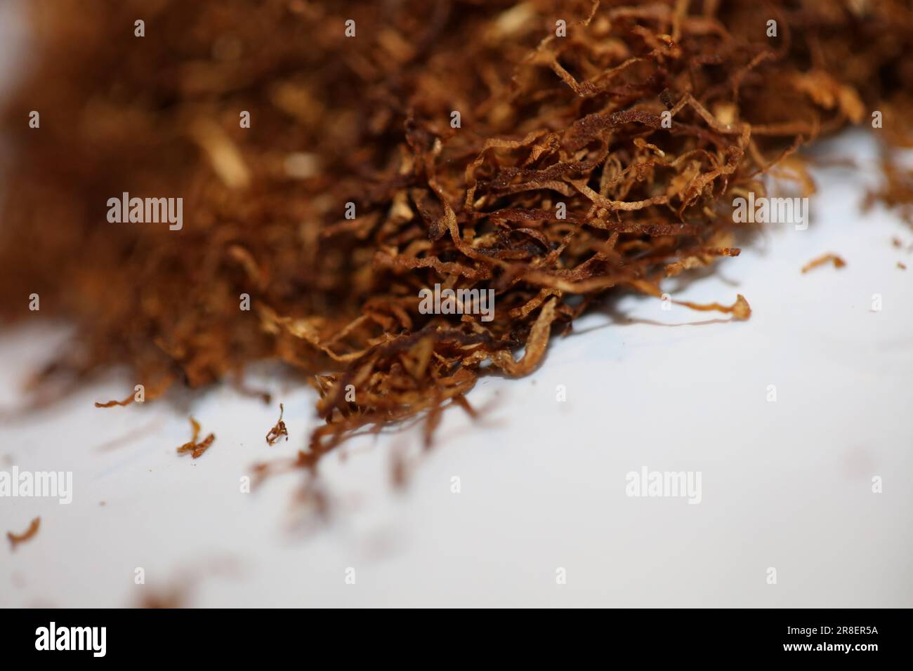 Rolling tobacco leaves lucky strike macro background stock photography
