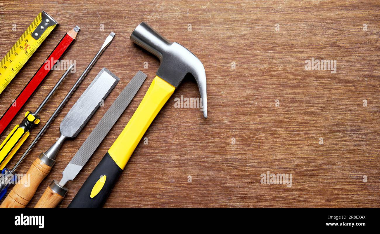 Carpentry tools on wood background with copy space Stock Photo