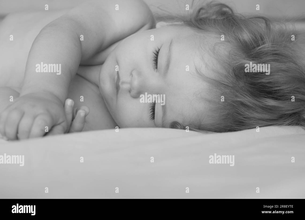 Baby sleeping in the bed. Quiet sleep, sleeping cute child Stock Photo