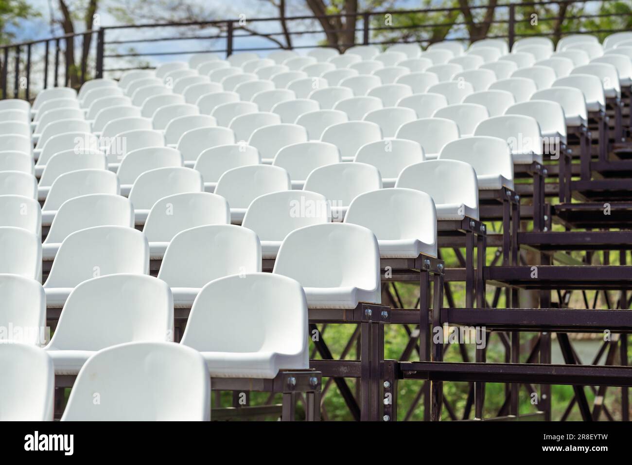 Tribune sports stadium with empty chairs Stock Photo - Alamy