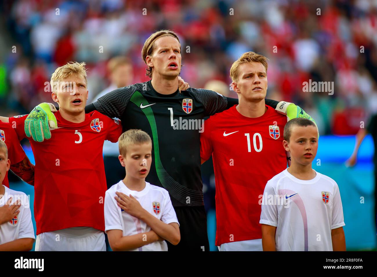 Oslo, Norway, 20th June 2023. Norway's Birger Meling, Ørjan Nyland and Martin Ødegaard during the national anthem before the UEFA Euro 2024 qualifier between Norway and Cyprus at Ullevål Stadium in Oslo   Credit: Frode Arnesen/Alamy Live News Stock Photo