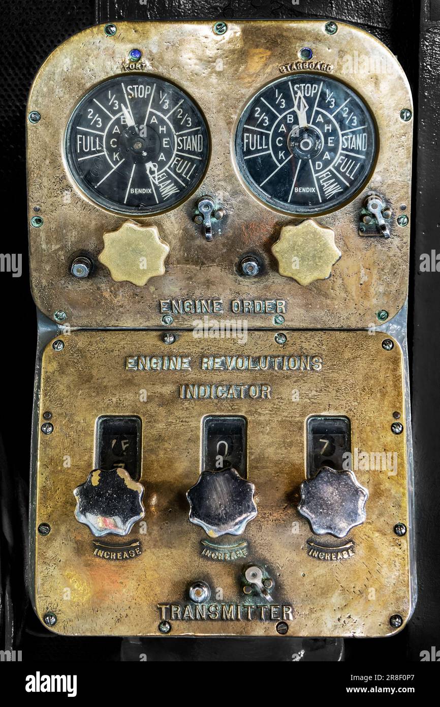 Vintage engine commands dashboard on the navigation bridge on the USS Midway, San Diego, California Stock Photo