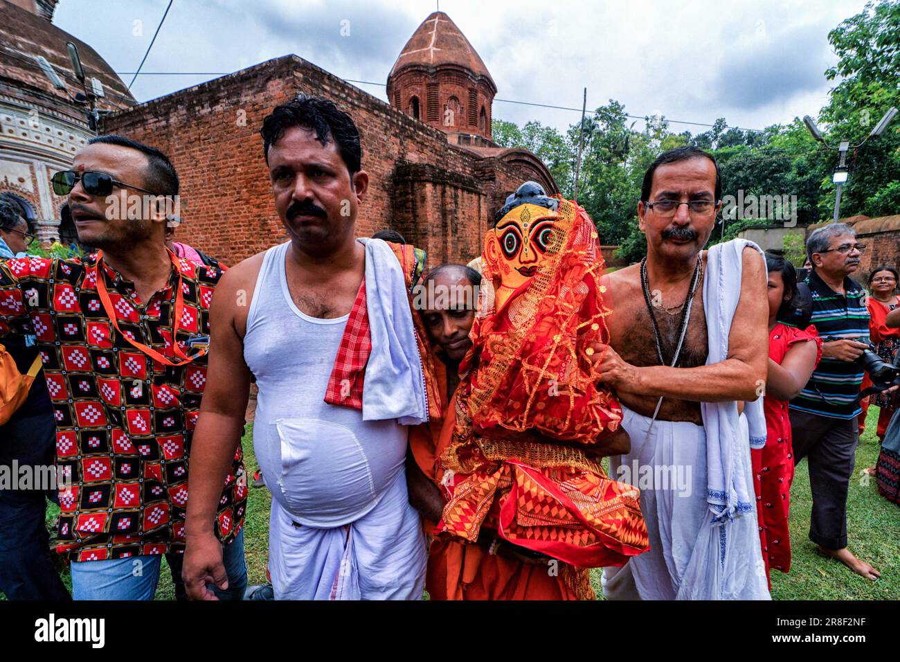 Guptipara, India. 20th June, 2023. Hindu devotees seen carrying an Idol of Lord Subhadra during the Chariot Festival/Ratha Yatra in Guptipara which is almost 100 km East from Kolkata. Ratha Yatra, also called Rathayatra, Rathajatra, or Chariot festival related to Lord Jagannath, is celebrated throughout the World as per Hindu Mythology. Rathayatra is a journey in a chariot of Lord Jagannath accompanied by the public celebrated annually. Dozens of faithful gathered to witness the festival. Credit: SOPA Images Limited/Alamy Live News Stock Photo