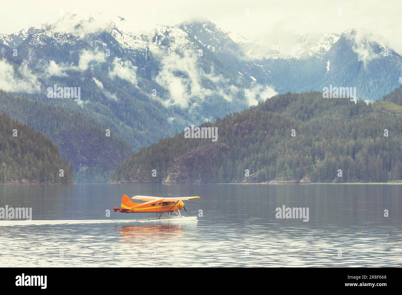 Float Plane in the mountains lake, Canada Stock Photo - Alamy