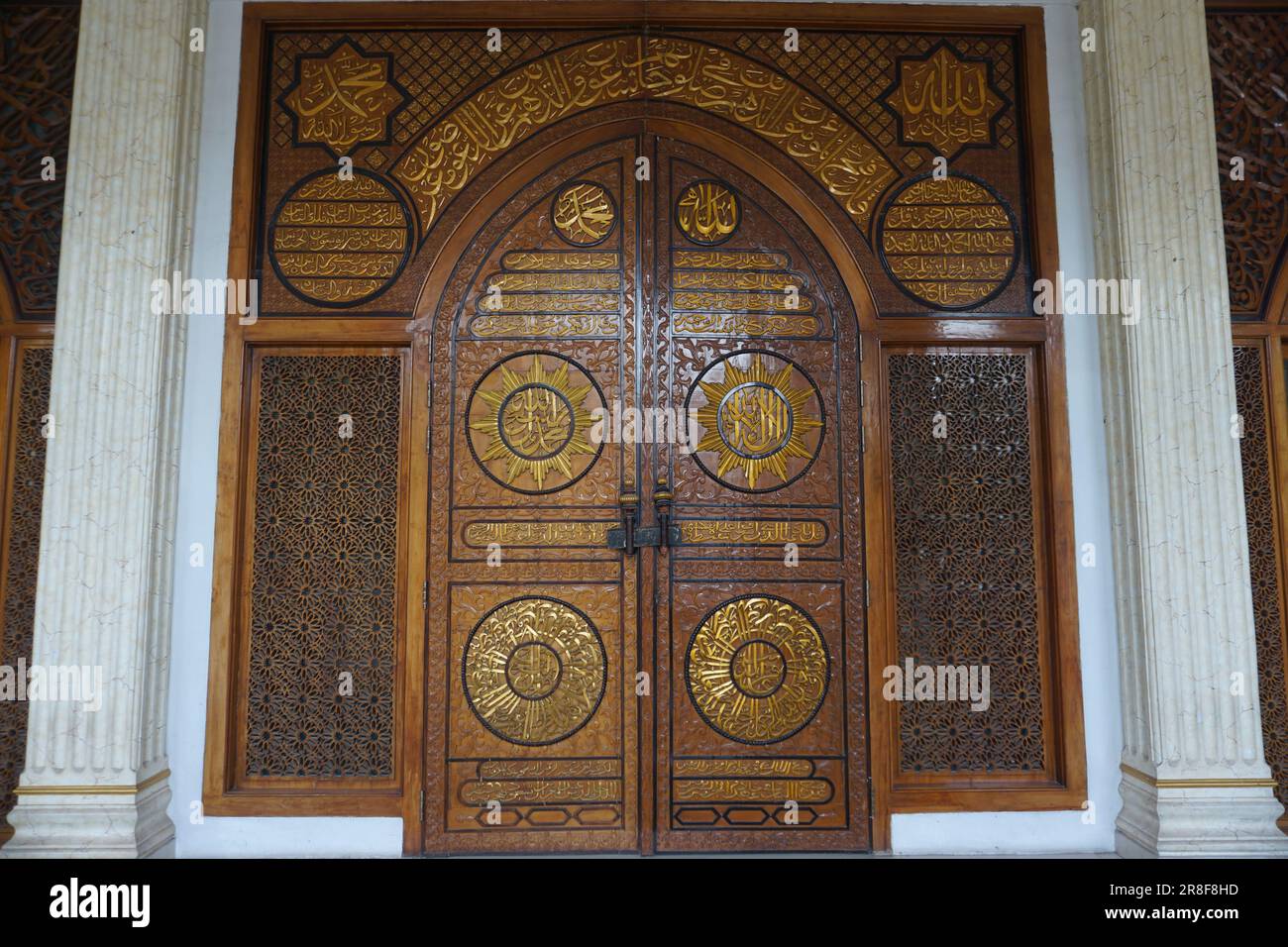 Very beautiful wood carving at the entrance of the mosque Stock Photo