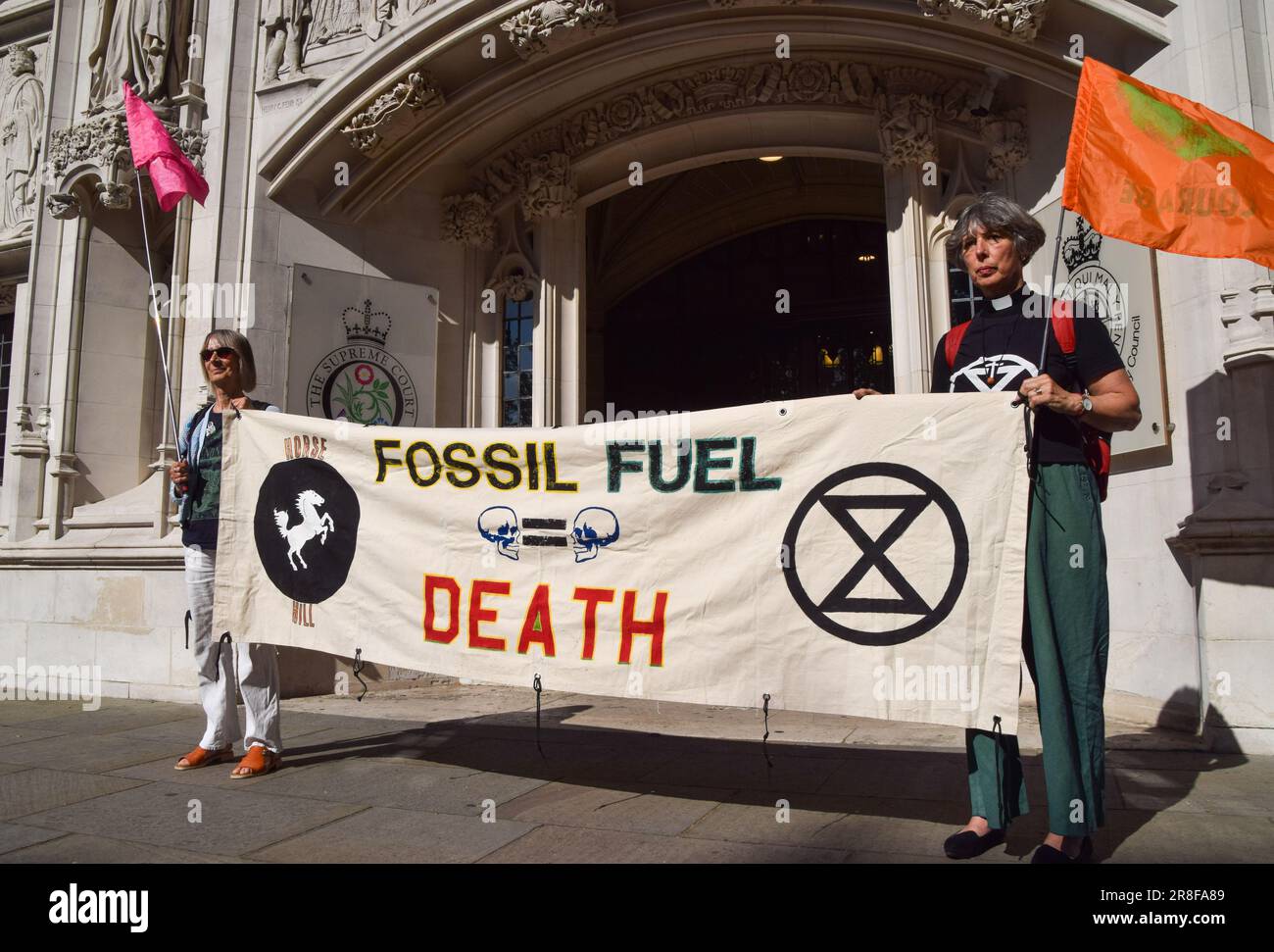 London, UK. 21st June 2023. Climate activists gather outside the Supreme Court in Westminster as legal action begins to prevent oil drilling at Horse Hill near Gatwick. Credit: Vuk Valcic/Alamy Live News Stock Photo