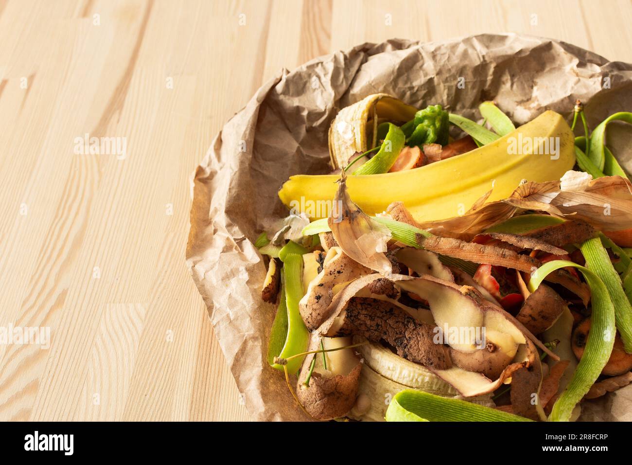 Food organic waste on eco friendly parchment paper, fruit and vegetable