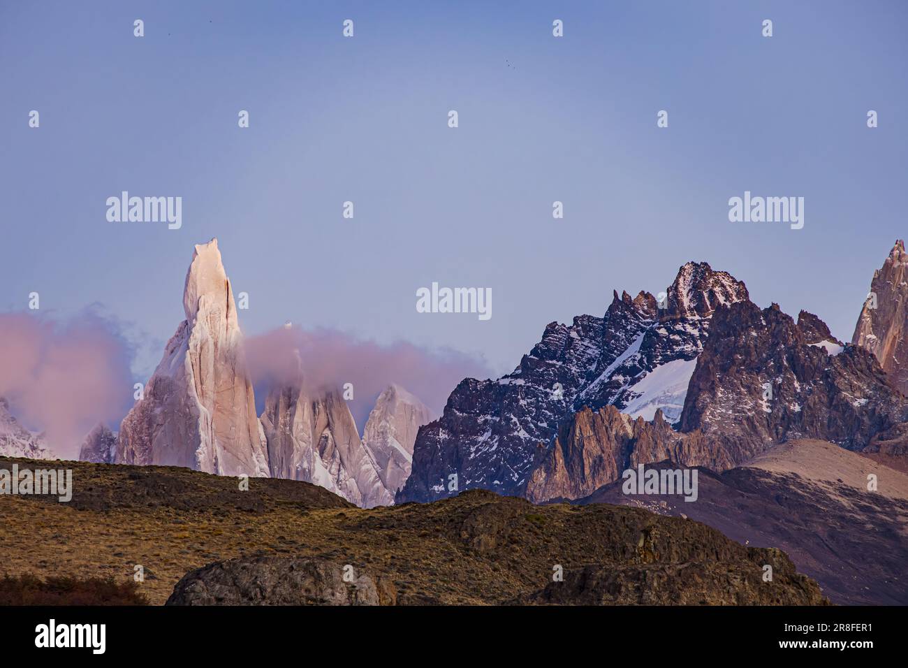 The steep granite mountain Cerro Torre in Los Glaciares National Park in the dawn, Argentina, Patagonia, South America Stock Photo