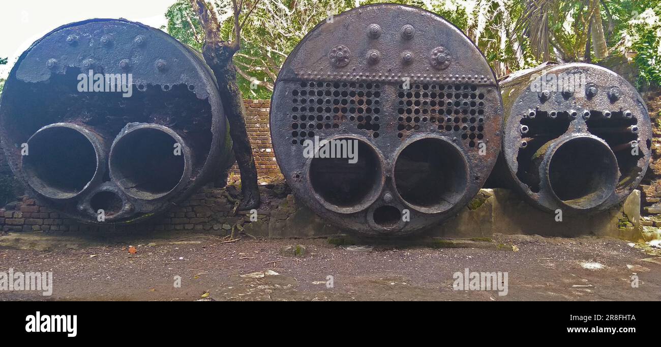 Old iron big water heating vessel which is required in mill factory Stock Photo