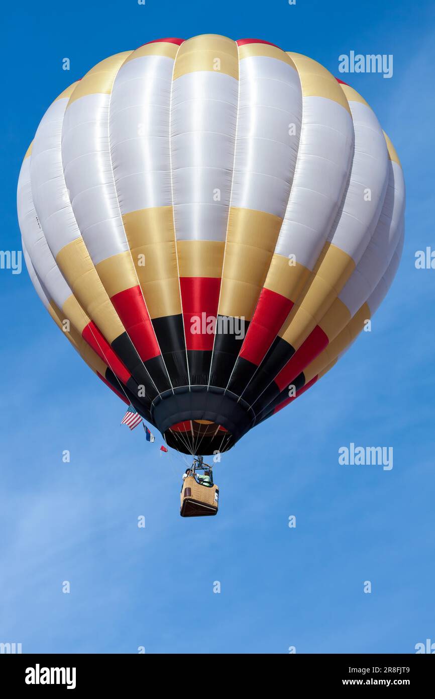 Hot air balloon with a rope and fishing hook Vector Image