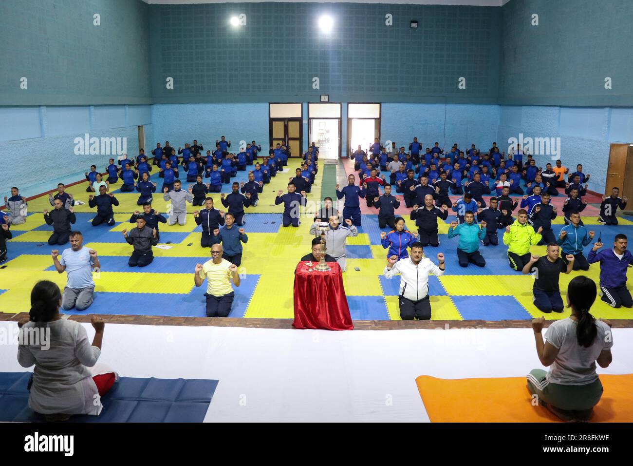 On June 21, 2023, in Kathmandu, Nepal. Members of the Nepal Police perform  yoga postures while taking part in a session during International Yoga  Day at the National Police Academy Headquarters. International