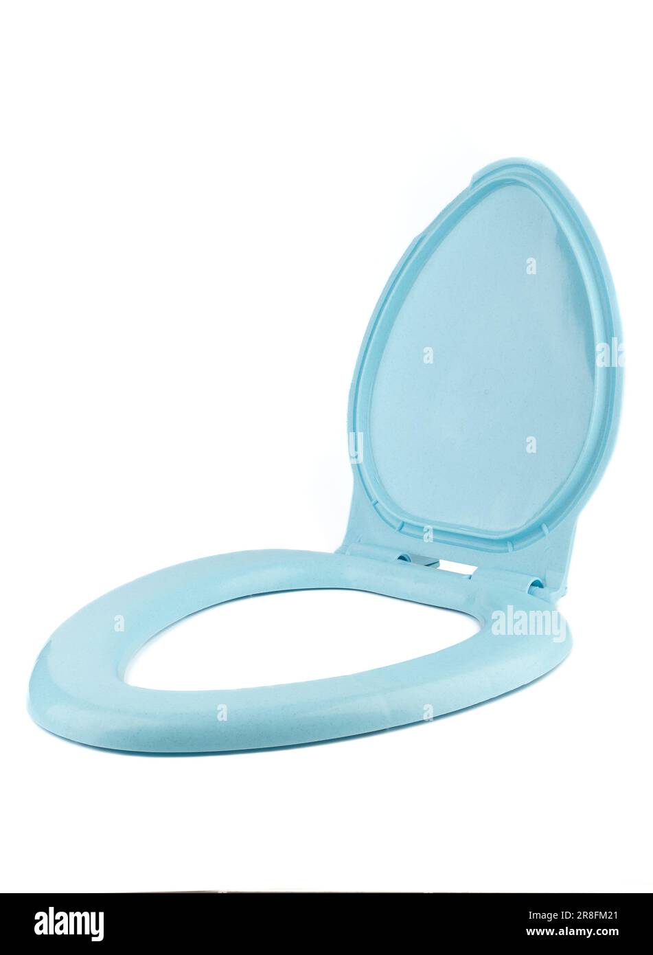 Blue toilet seat with a lid on a white background. Copy space Stock