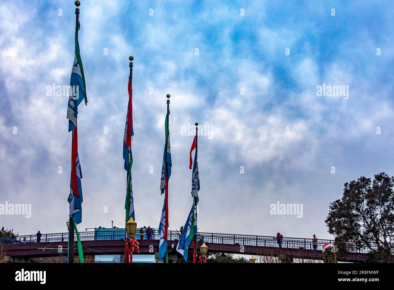 Flags at the top of the flagpole of pier 39 of the fisherman's harbor