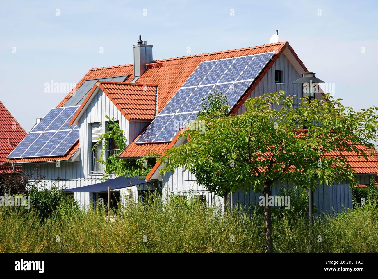 Solar panels on the roof of a house Stock Photo