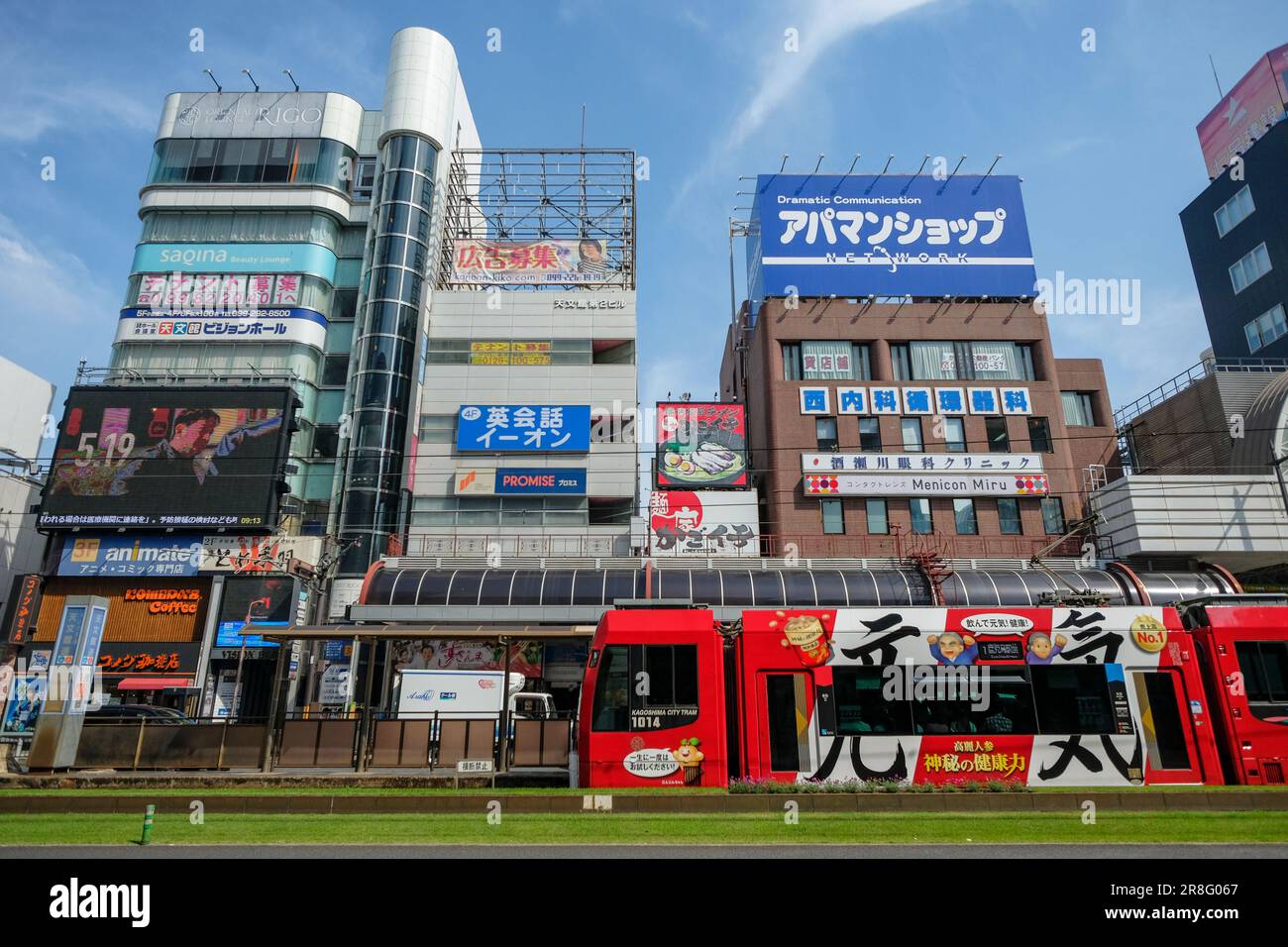 Kagoshima, Japan - May 17, 2023: A tram running through the center of Kagoshima, Japan. Stock Photo