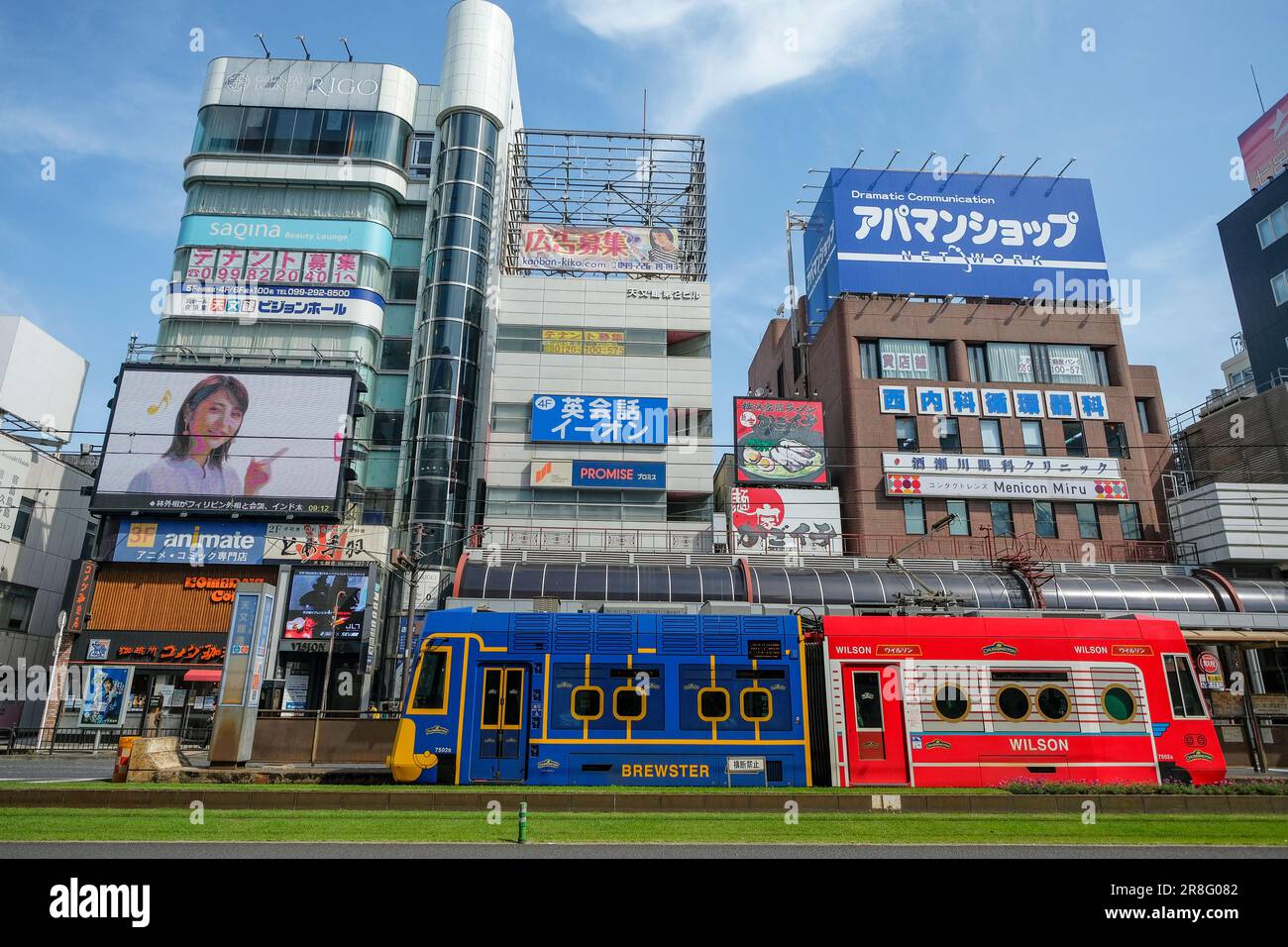 Kagoshima, Japan - May 17, 2023: A tram running through the center of Kagoshima, Japan. Stock Photo
