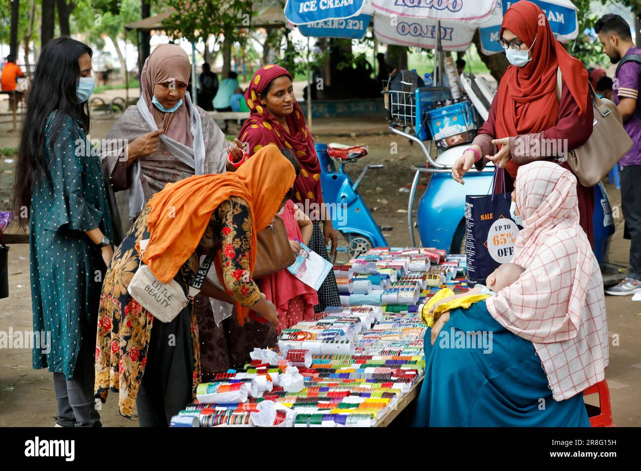 Dhaka, Bangladesh - June 20, 2023: A vendor is selling traditional