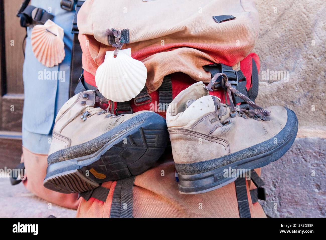 Pilgrim's backpacks with scallop shell and hiking boots, St. -Jean-Pied ...