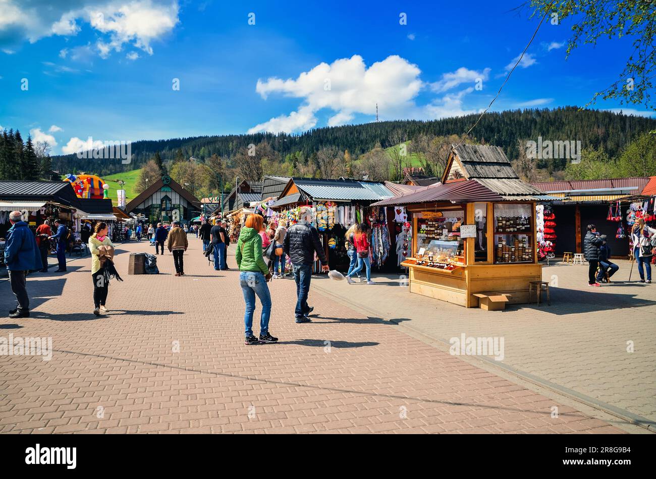 Zakopane, Poland - May 8, 2016: Tourists on a popular Krupowki street in Zakopane, Poland. Stock Photo