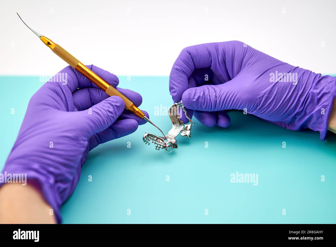 Dental Technician Making New Dental Prosthetics In Laboratory Stock