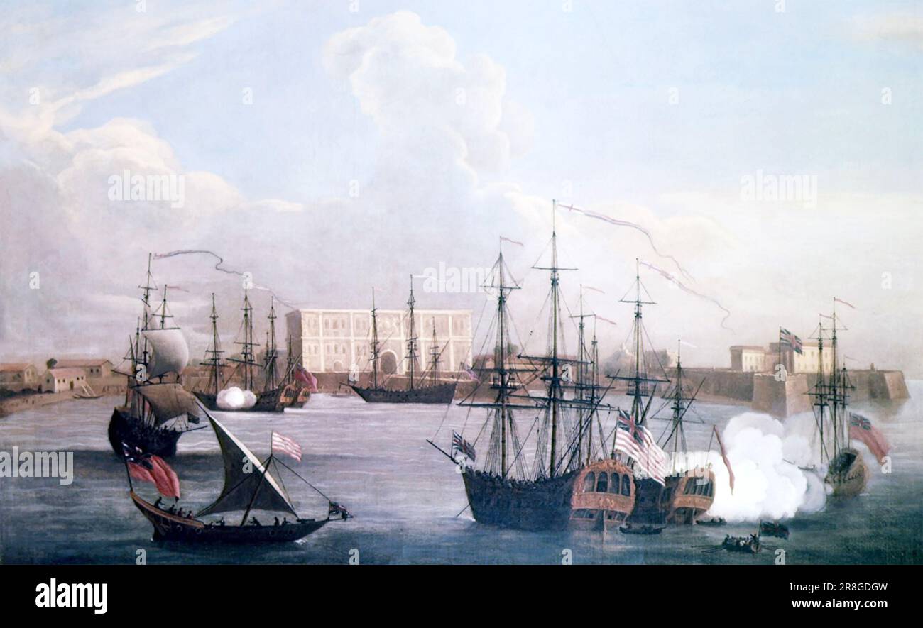 BOMBAY HARBOUR about 1730 with a ship flying the red and white striped flag of the East India Company. Stock Photo