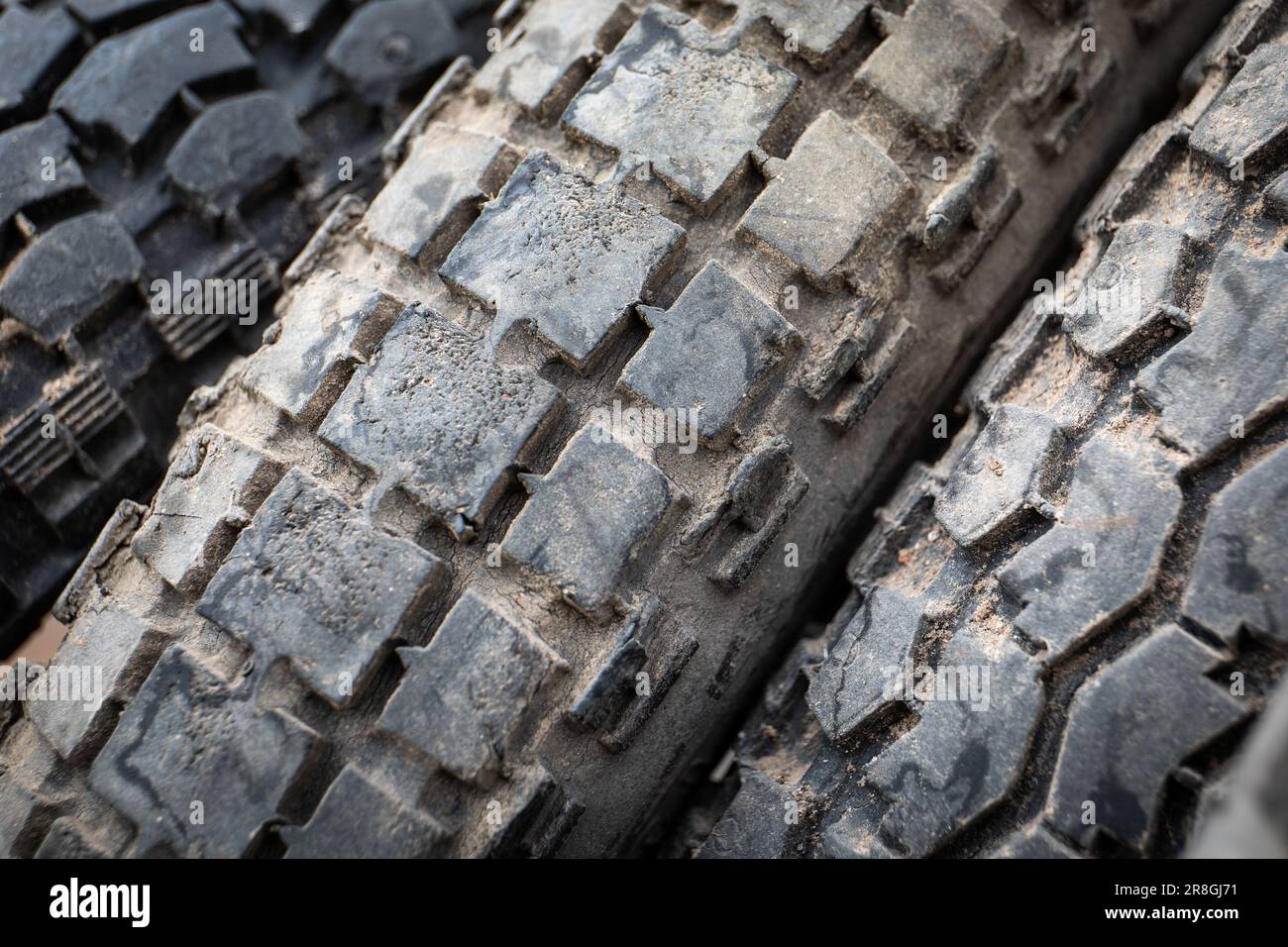 Old motorcycle tires. Dirty tire treads. Waste collection and recycling
