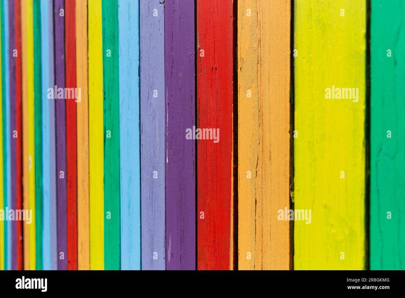 A old fence paint bright colors to make bold pattern. Stock Photo